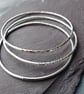 Set of three silver stacking bangles