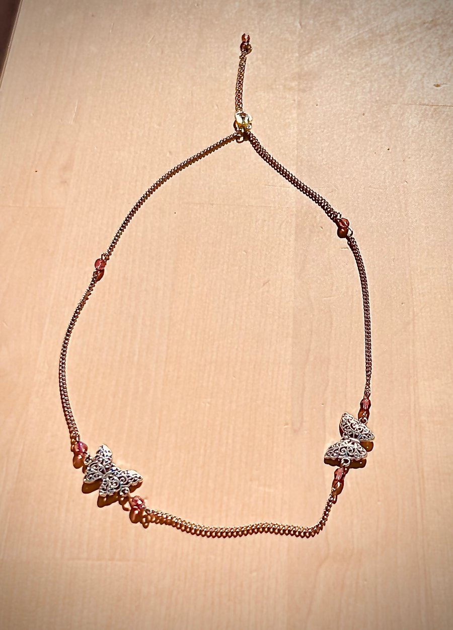Purple and silver butterfly necklace 