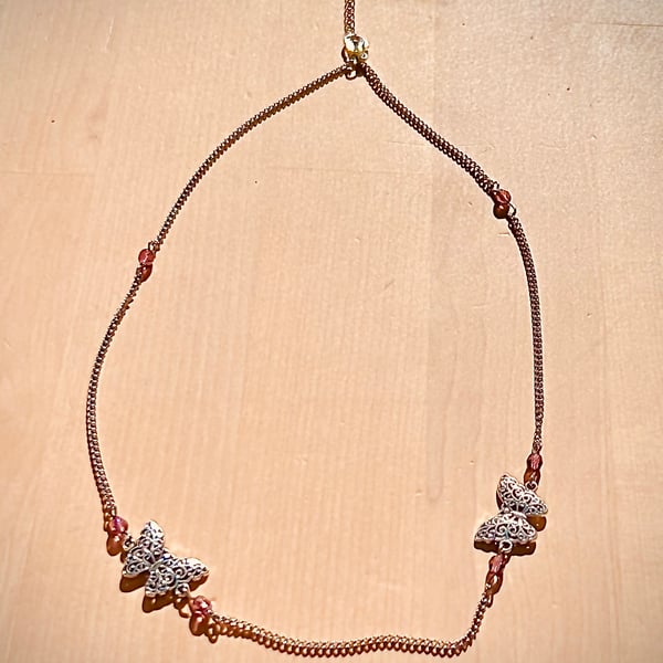 Purple and silver butterfly necklace 