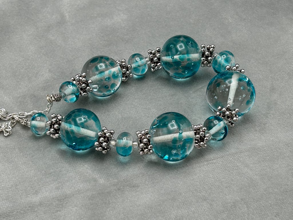 clear and turquoise spotted lampwork glass beaded necklace