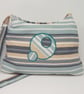 Soft fabric shoulder bag in seaside stripes - Image 1