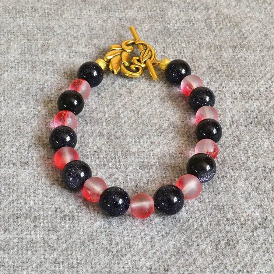 Blue Goldstone and Frosted-Red-Glitter Glass Bead Bracelet