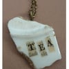 'Tea' pendant.