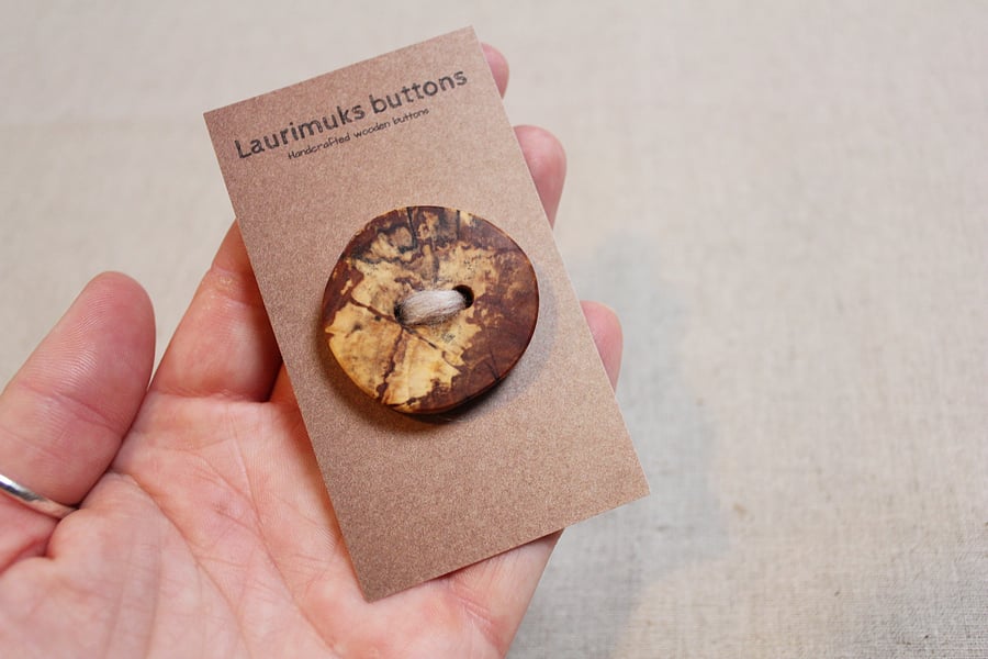 Large wooden statement button