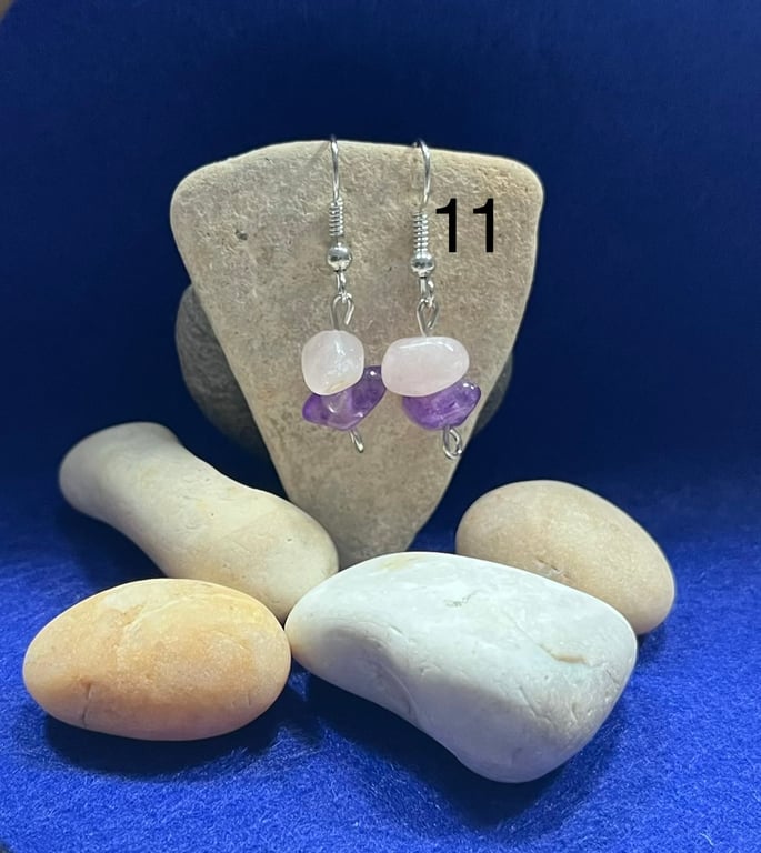 Beautiful dangling earrings with pink and purple stones.