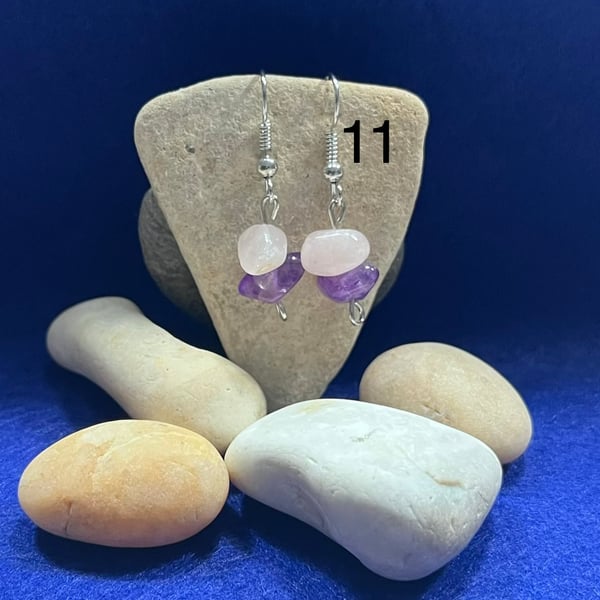 Beautiful dangling earrings with pink and purple stones.