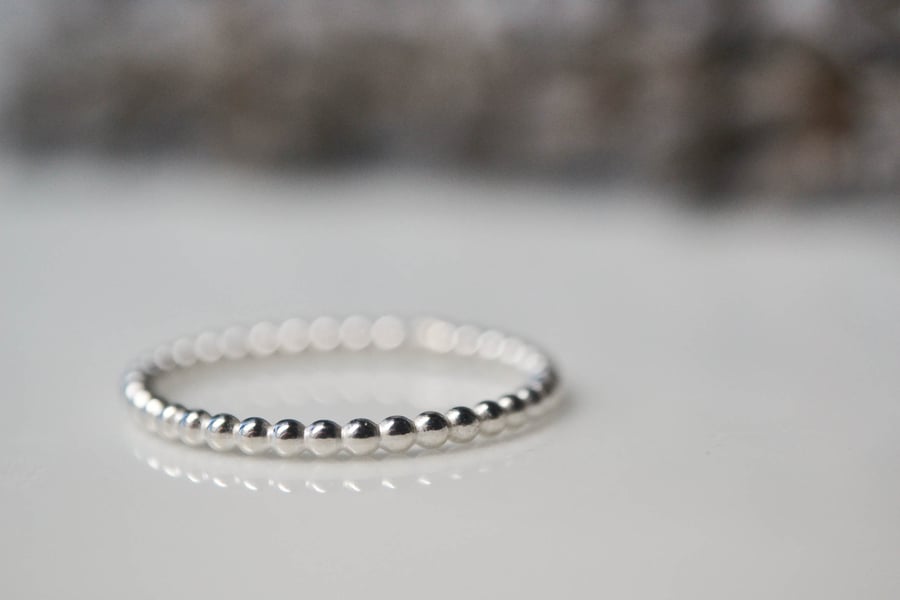 Dotty band sterling silver ring