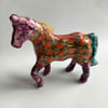 Horse of many colours