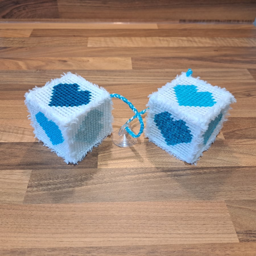 Novelty hanging cubes with blue hearts and sucker-cup attachment 