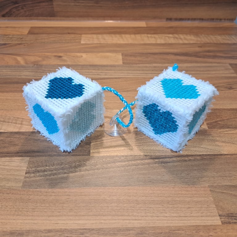 Novelty hanging cubes with blue hearts and sucker-cup attachment 