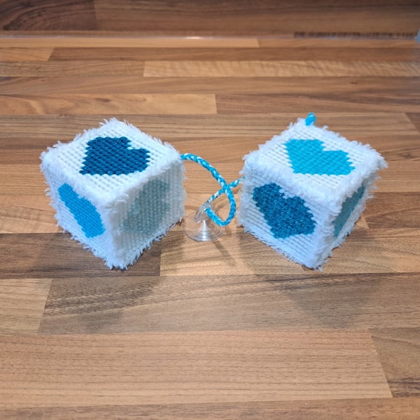 Novelty hanging cubes with blue hearts and sucker-cup attachment 