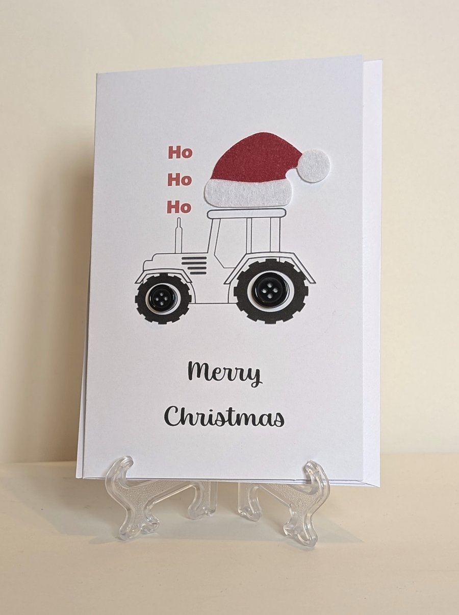 Merry Christmas button card with a tractor saying HO HO HO and Santa hat