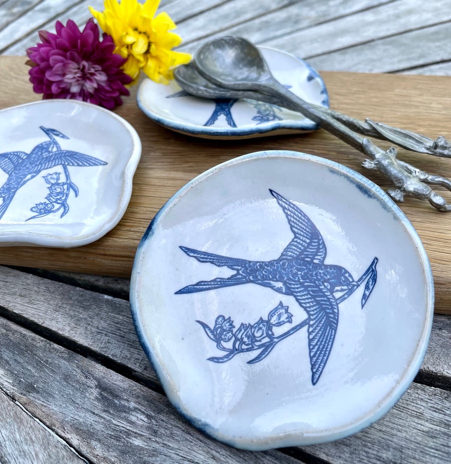 Handmade trivet spoon rest with swallow illustration 