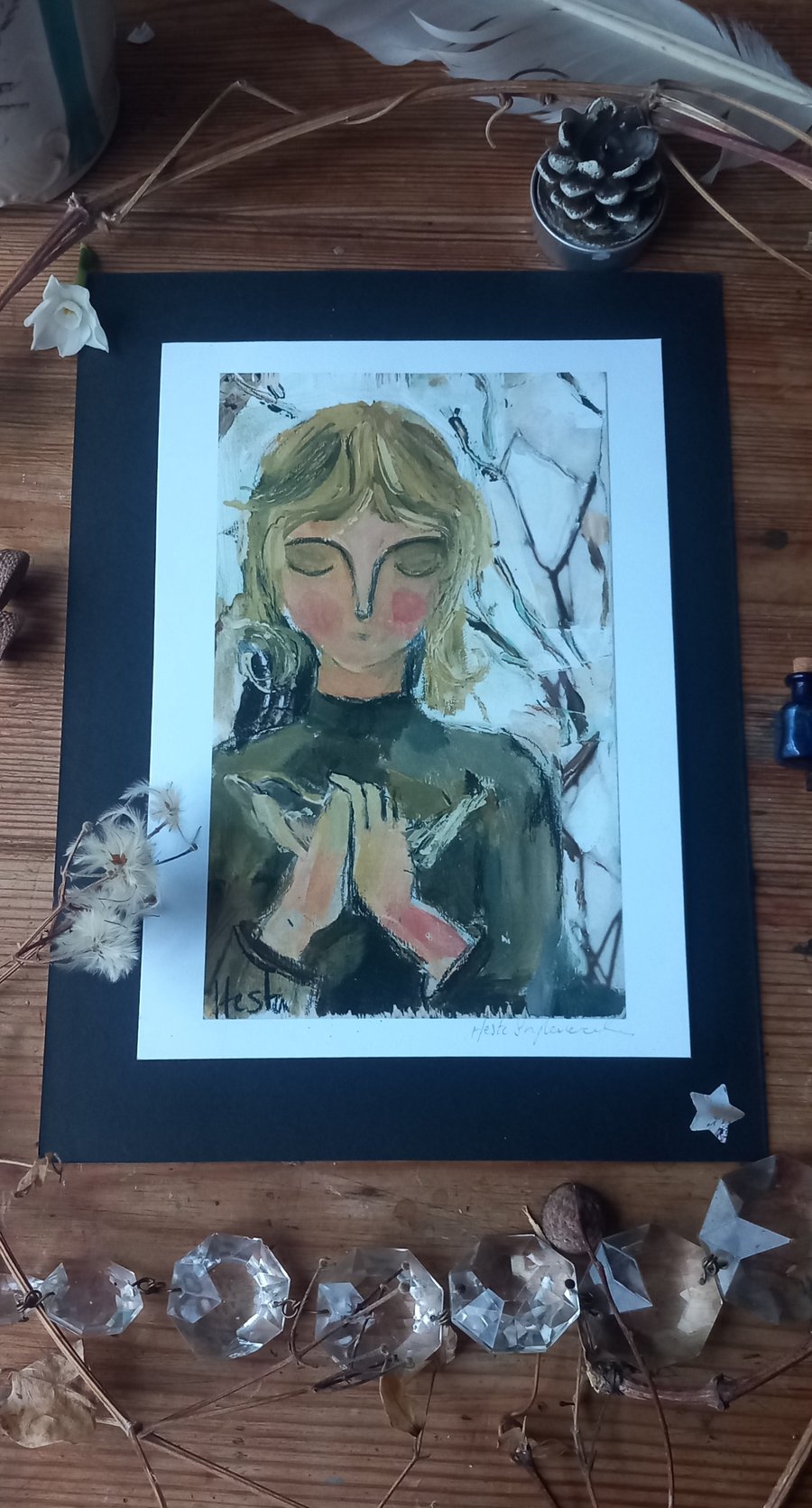 Girl holding bird print 'winter solstice '