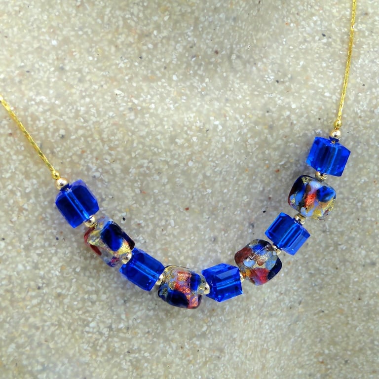 A Crystal Necklace with Swarovski Blue cubes and Murano blue and gold cubes