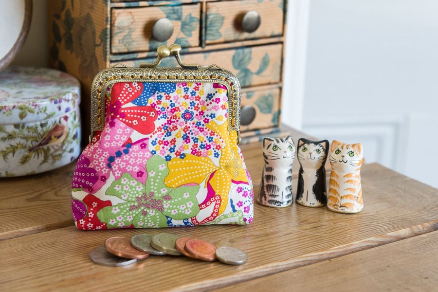 Coin purse made with colourful Mauvey print Liberty Lawn and golden lining