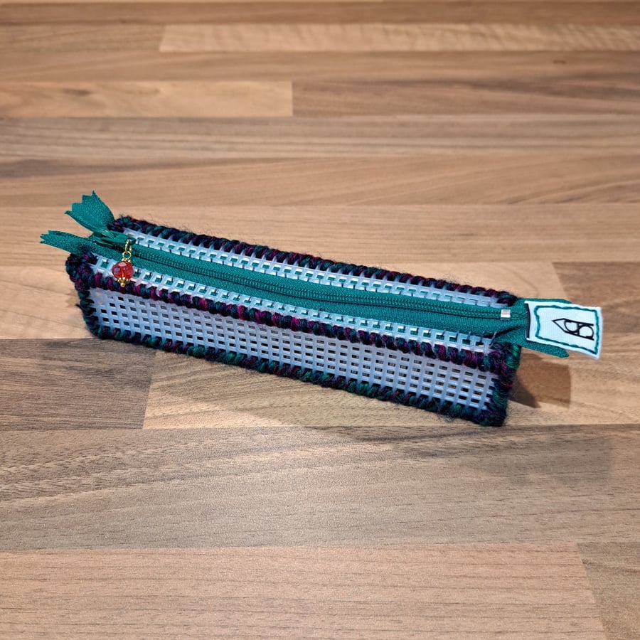 Pencil case - see-through with red, green, navy edge, green zip, red charm