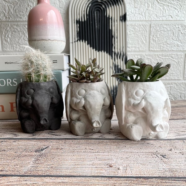 Concrete elephant planter 