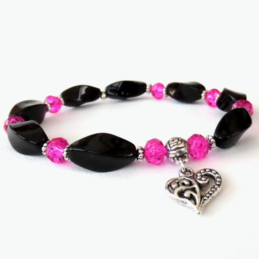 Black onyx bracelet with pink crystal and heart charm