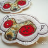 fabric brooch - zombie meerkat (yellow)