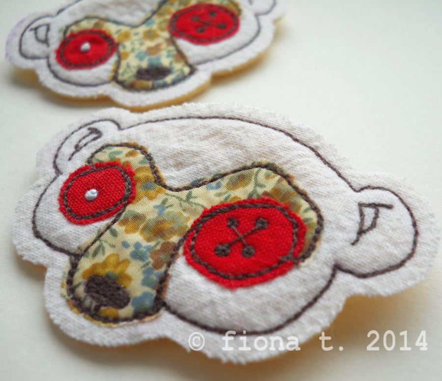 fabric brooch - zombie meerkat (yellow)