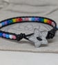 Pride flag beaded bracelet with black leather and star button - Image 7