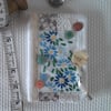 Sewing needle case with repurposed embroidery blue