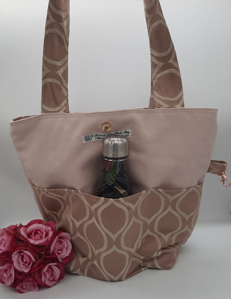 Dusky pink tote bag with pockets. 