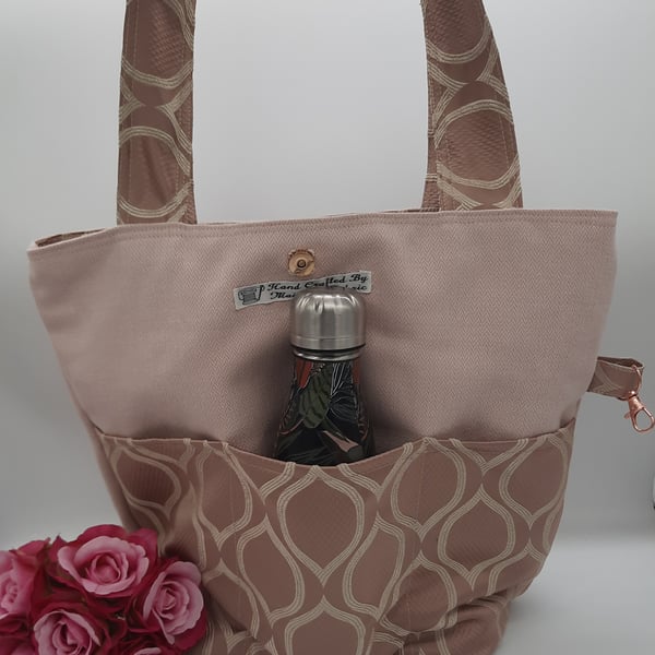 Dusky pink tote bag with pockets. 