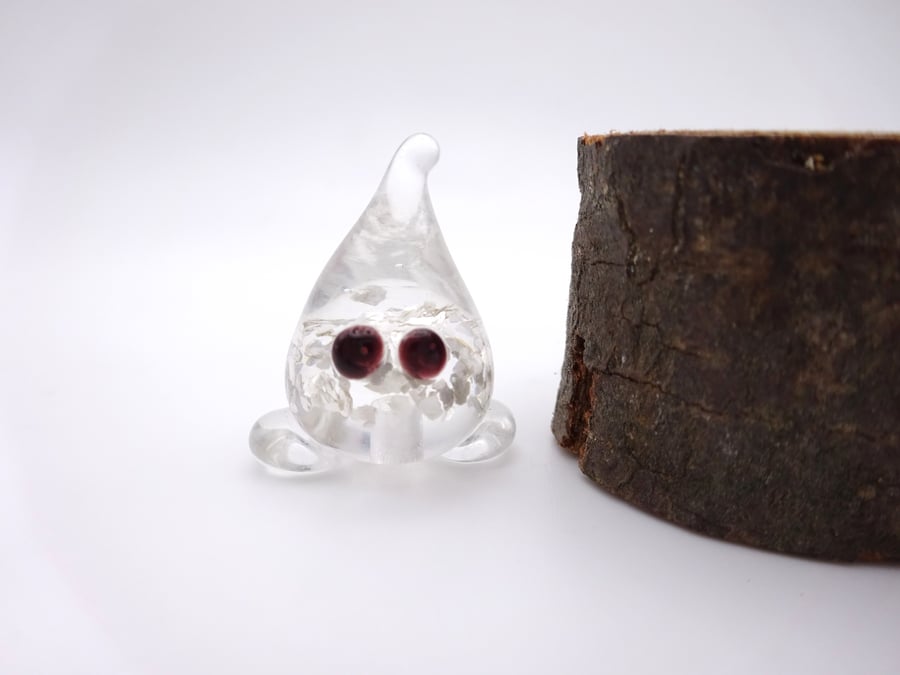 small glass wisp figure