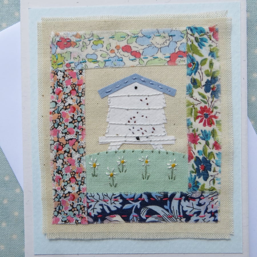 A Little Beehive hand-stitched card with embroidered bees and flowers
