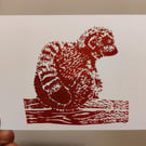 Original Lino Print of a lemur sitting watching tourists at a wildlife park