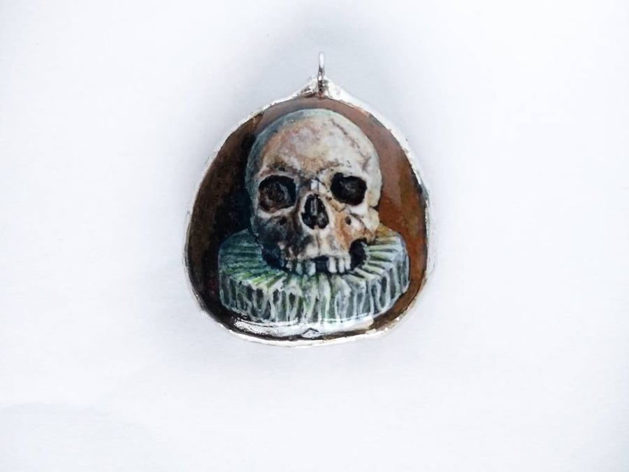 Miniature painting on a sea stone skull pendant. Human skull jewelry ornament. d