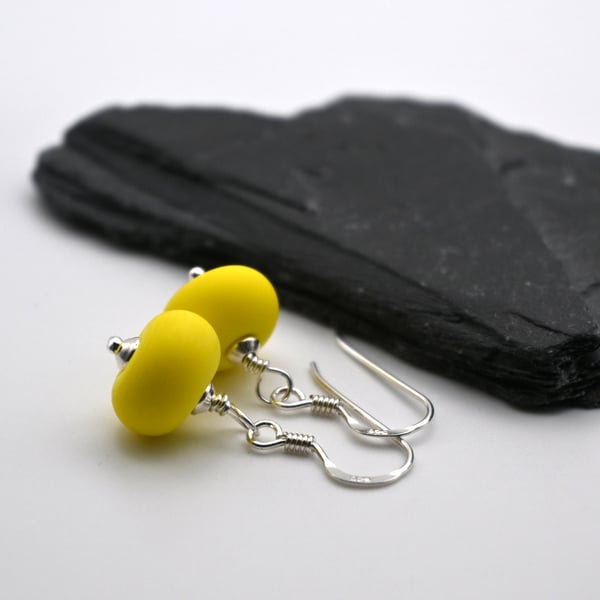 small yellow lampwork glass earrings
