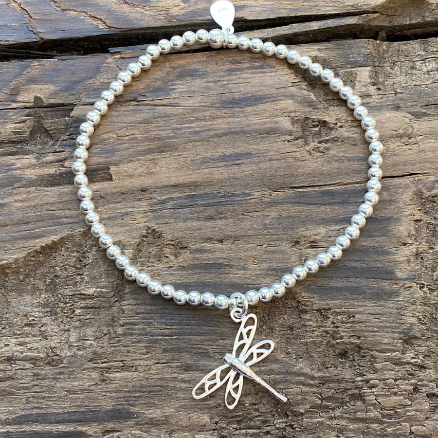 Sterling silver bead bracelet with dragonfly charm. Stretch bracelet. 