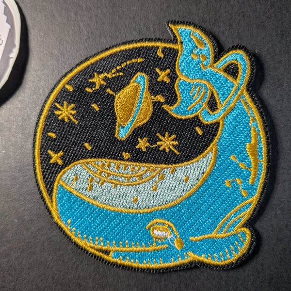 Blue whale with a planet and stars  - Embroidered Iron on Patch