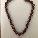 Spiral necklace with cross
