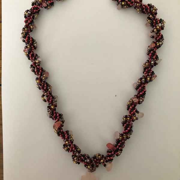 Spiral necklace with cross