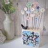Clay and Button Flower Garden in a Floral Wood Block with Blackbird