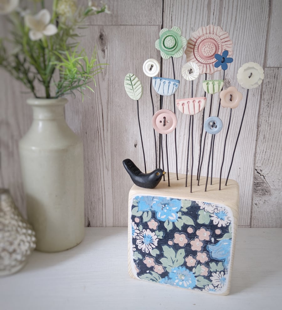 Clay and Button Flower Garden in a Floral Wood Block with Blackbird