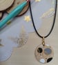 Monochrome circular patterned wooden necklace 