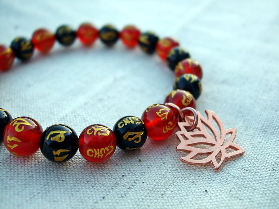 Copper Lotus Charm Om Mantra Bracelet, Black and Red Agate