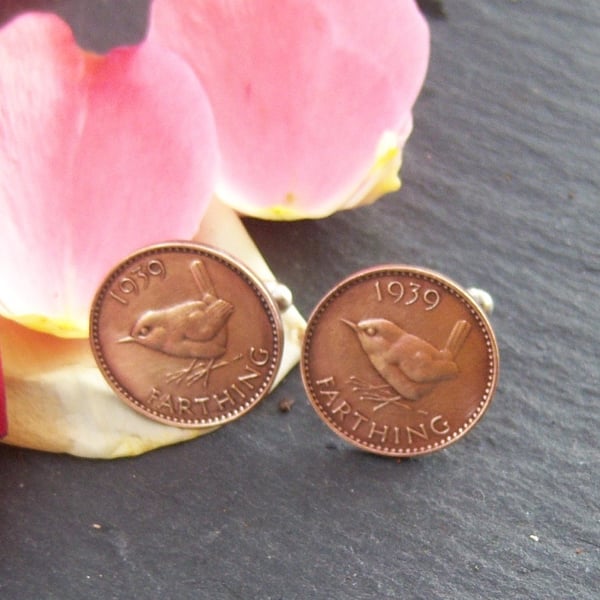 Cufflinks made from farthing coins with wren  