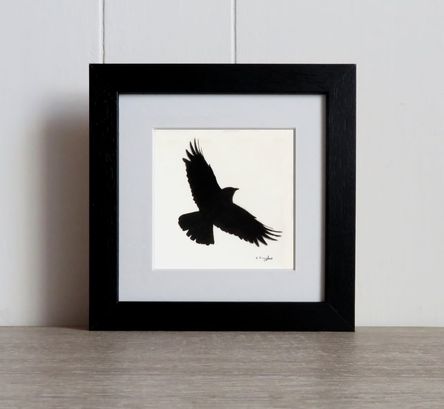 Courting Crow 4, original charcoal pencil drawing of a flying crow, framed.