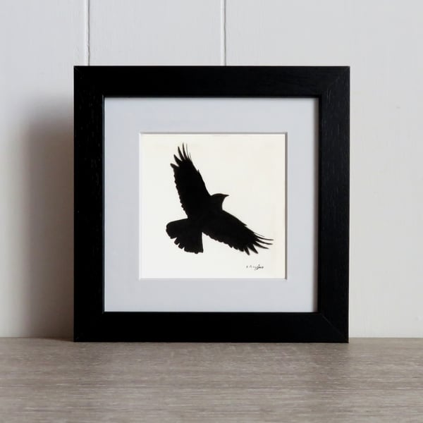 Courting Crow 4, original charcoal pencil drawing of a flying crow, framed.