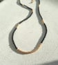 Glass beaded necklace, black and gold, 16 to 18 inches
