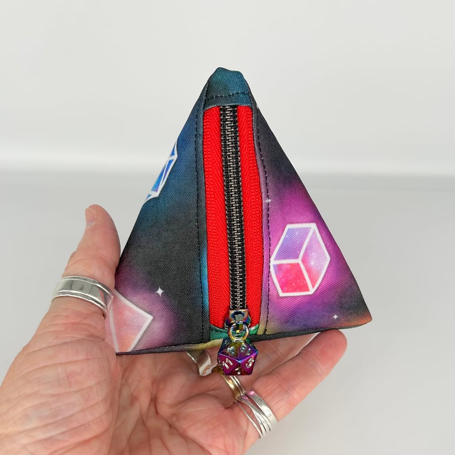 Dice bag for dnd role playing games, D4 shape, die print on dark background..