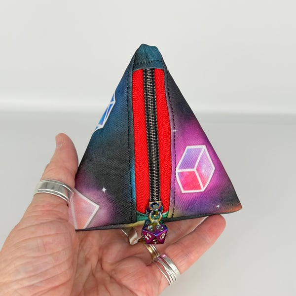 Dice bag for dnd role playing games, D4 shape, die print on dark background..