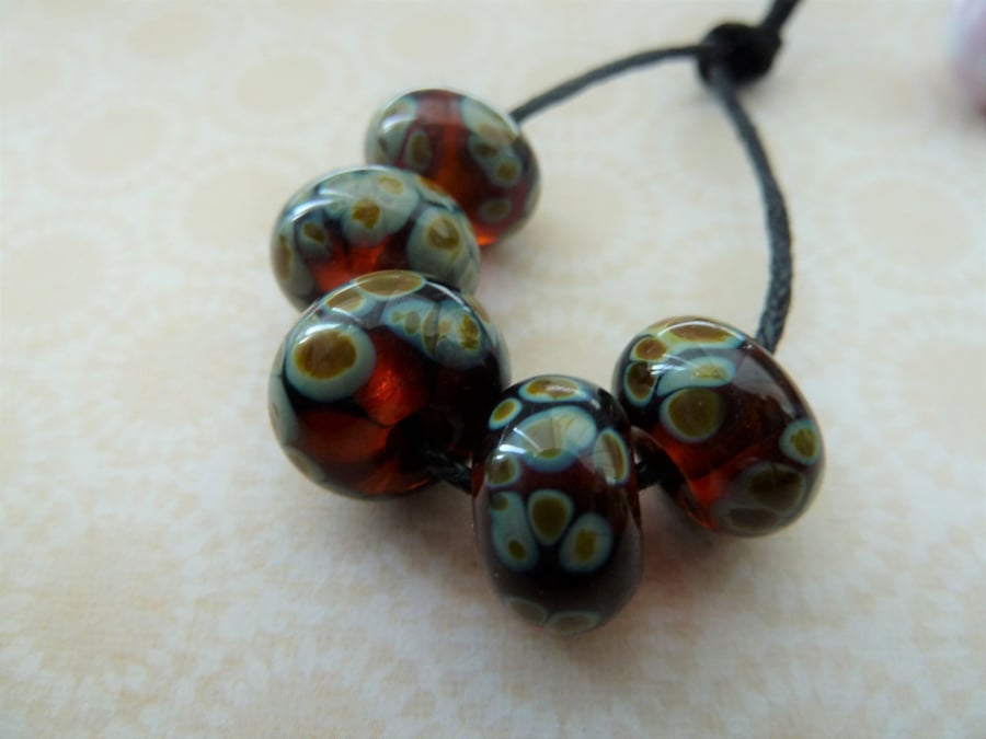 handmade amber raku lampwork glass beads