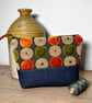 Dark denim and chenille pouch with orange and lime pattern